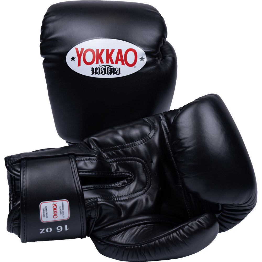 A pair of black Yokkao 16 oz boxing gloves