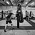 man punching boxing bag at gym learn how to choose the right punching bag