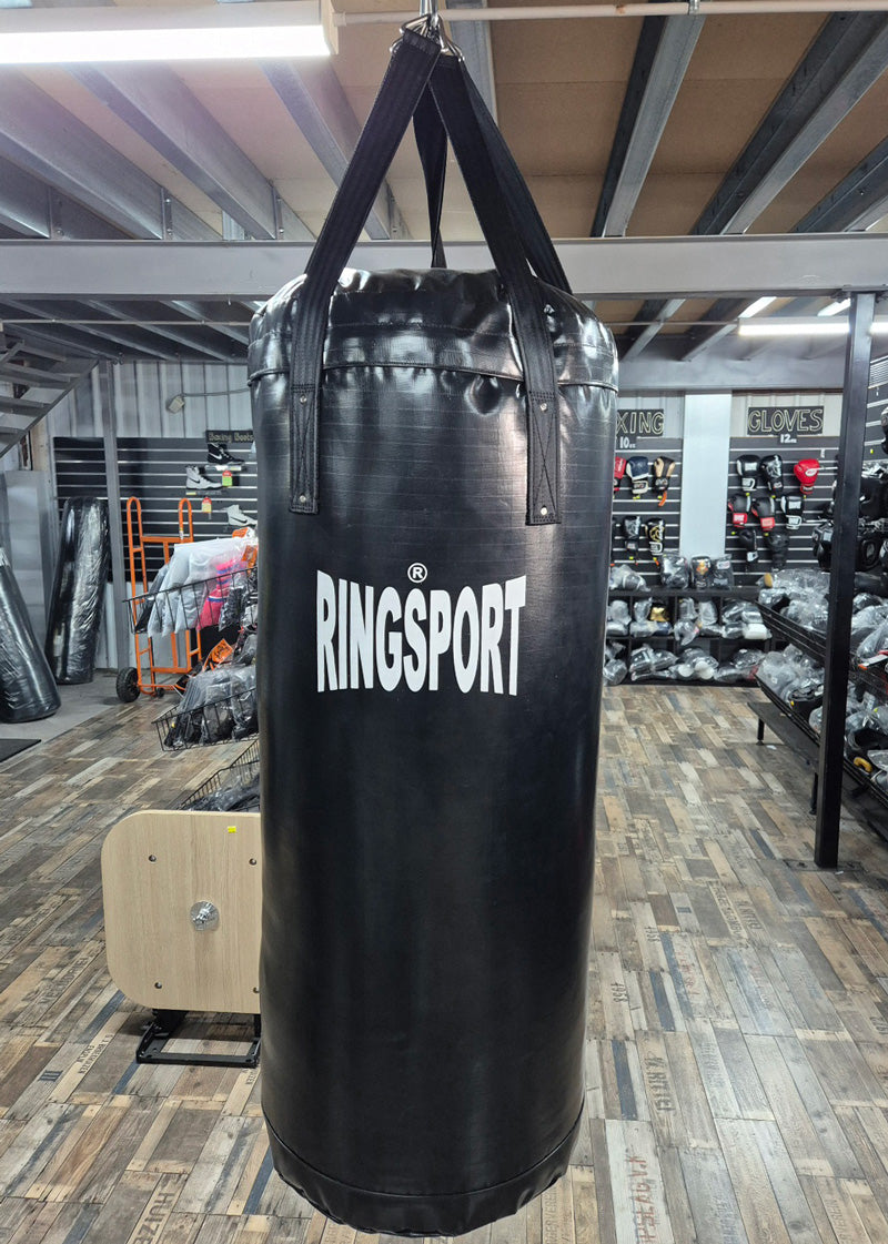 A heavy punching bag with the brand name 'RINGSPORT 120x 50cm